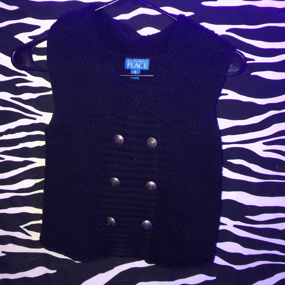 Black sweater vest with buttons